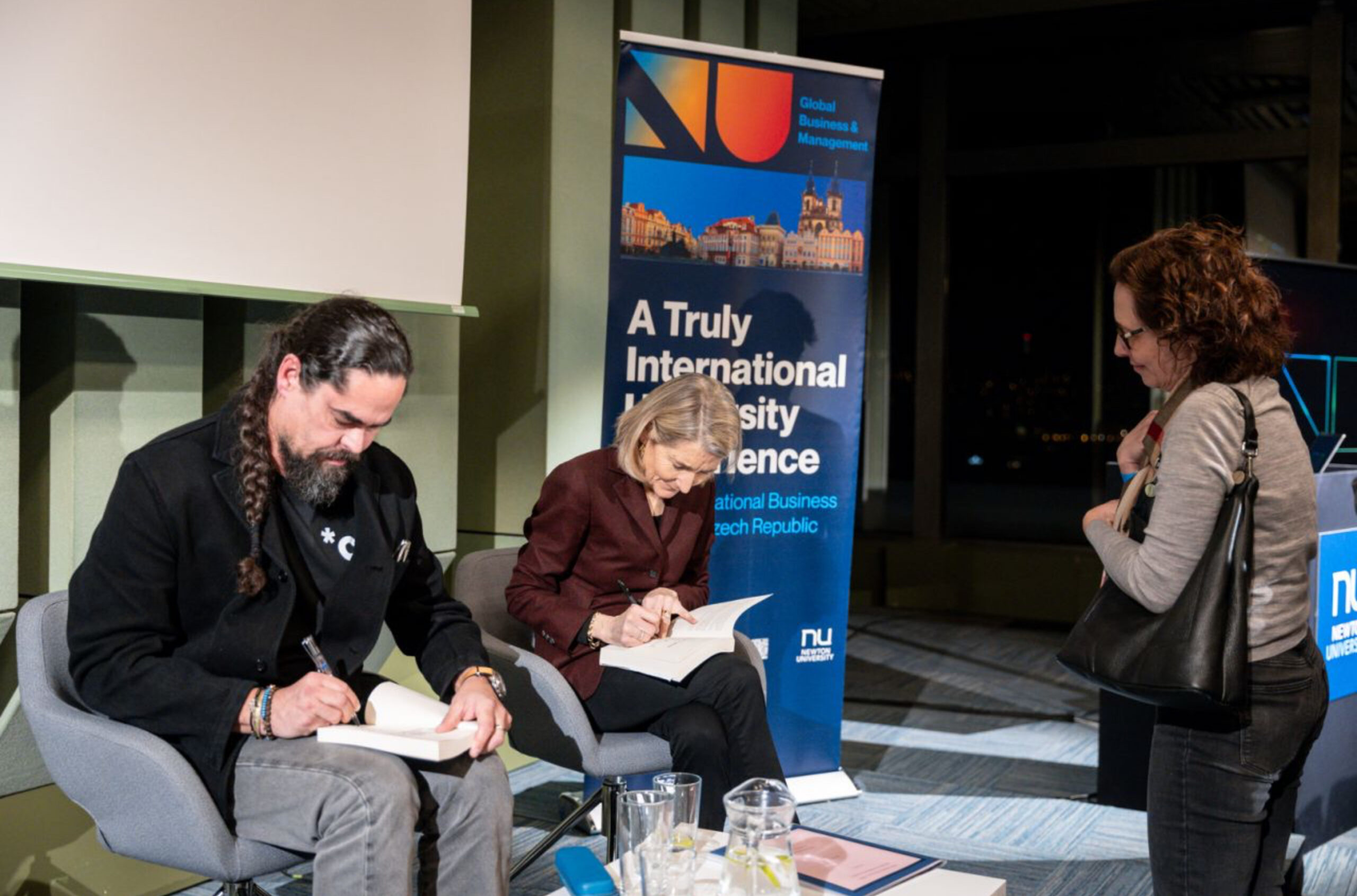 Tomas Studenik with Amy C. Edmondson signing their books